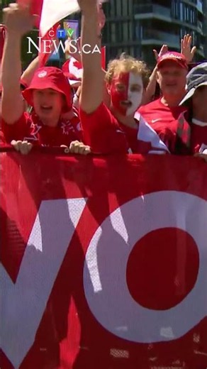 Canada fans march through the streets of Vancouver ahead of World Cup match against Qatar