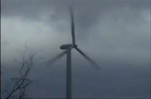 Windmill self-destructs in storm.