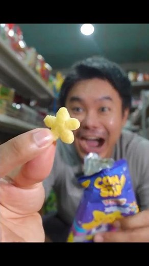 Secretly eating Corn Star party snacks