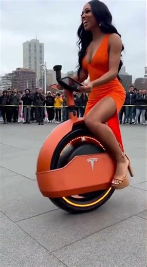 Woman in Orange Tests Tesla One Wheel! ⚡ SUPER Stable Matching 🧡