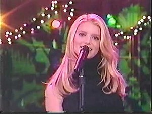JESSICA SIMPSON - " ROCKIN' AROUND THE CHRISTMAS TREE " - LIVE.