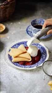 Roasted strawberry rhubarb sauce with homemade lemon ice cream and crepes