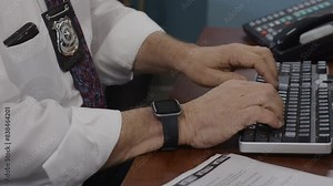 Cop doing paperwork on PC computer