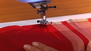 Discover exclusive quilting features like the Sew Straight Laser Vision Guide found on the DreamWeaver VQ3000 - a must-have for piecing, edge joining, pintucking and aligning multiple lines of stitches! | Brother Sews