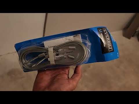 Installing safety cables in garage door springs