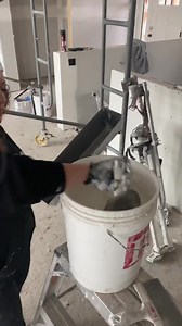 Getting ready to jump on stilts and do some coat work with a 10” - I slide my 6” in between the handle and the bucket so it’s always there when I need to load my pan again | Drywall Shorty