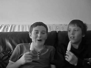 2 boys eating a popsicle :L