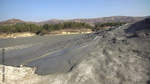 Interesting view mud volcano bubble boiling. Mud Volcanoes stand for one of the most interesting mixed reservation. Gas Coming Out of the Mud Volcanoes of Methane. Bubbling Mud Pool - Timelapse