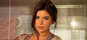 Demi Rose Shows Off Her Beach Body With Nothing But Gold Paint