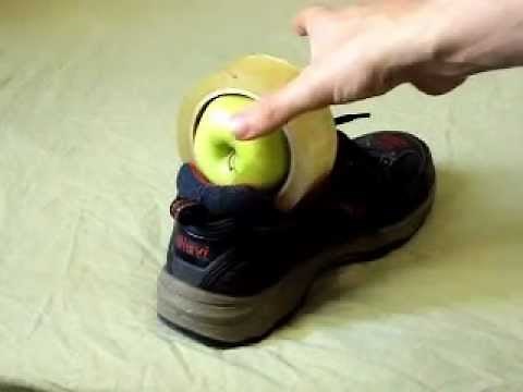 How to take roll of tape out of shoe without touching it using an apple - How To Do Anything TV