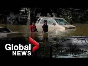 Malaysia floods: Drone footage shows buildings underwater as thousands displaced
