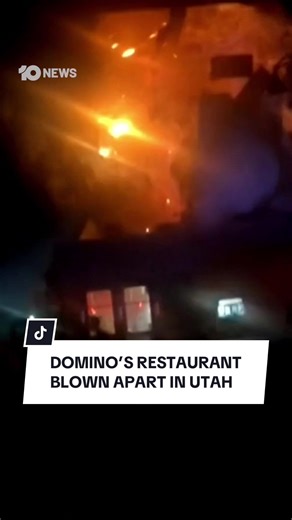 Terrifying vision has captured the moment a Domino's pizza restaurant in Utah was turned to rubble after a massive explosion ripped through the building. Footage shows the moment a car veered off the road and slammed into the business - triggering the blast. #explosion