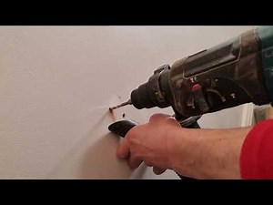 How to fit a handrail to a solid wall