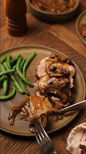 Smothered pork tenderloin golden crust, mushroom pan sauce & pure comfort!#porktenderloin