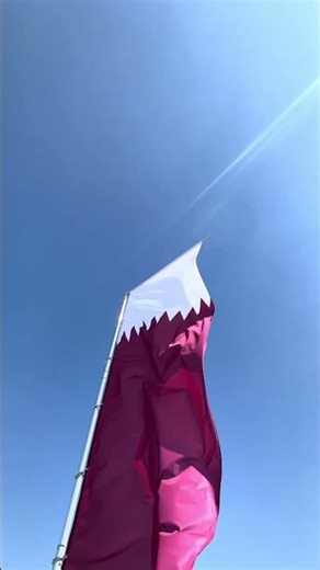 Flying Qatar flag