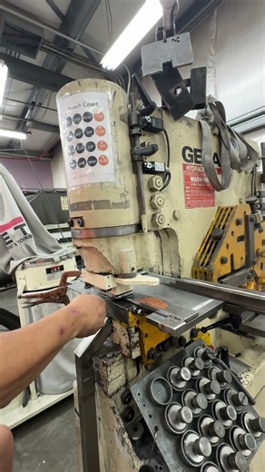 Ironworker punching holes in Stainless Steel for mounting plates. AGS DIY Railing systems. #diy