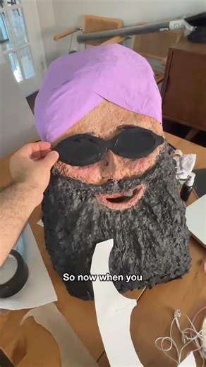 The making of a giant paper mache head