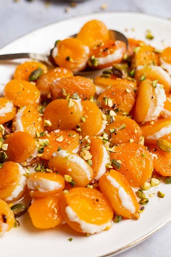 This Turkish-style apricot dessert recipe is deliciously fragrant and so easy to make! https://themeddish.com/Turkish-Stuffed-Apricots | The Mediterranean Dish