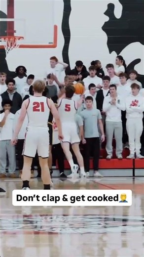 Basketball player clapping at offensive player, gets fired up and blocks it out of bounds!