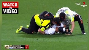 Grand Final pitch invaders tackled