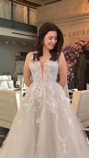 Hues of lavender, 3D floral appliqués, multi-colored tulle - this romantic a-line gown gives so many fun and flirty feels! What do you love most about “Nadia” 💐🪻