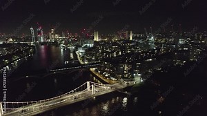 Cadogan Pier and the Albert bridge on the river thames, Vauxhall, Battersea Power Station, Wandsworth at night