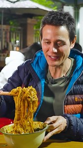 Breakfast happiness in Chongqing, China!! This is a variation of xiao mian, with noodles, smashed potato, minced beef, and numbing chili oil 🌶️ #xiaomian #Chongqing #ipplan | Mark Wiens