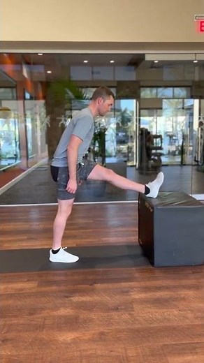 Standing hamstring stretch with leg elevated - Fit Family Physical Therapy