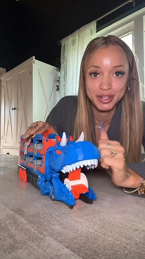 A large dinosaur shaped truck toy for kids that instantly captures kids' attention while storing and carrying the included sports car for endless fun with our dinosaur toys for kids. Featuring 12 colorful and durable sports cars, the Dinosaur Toy is designed for little hands to make playtime exciting and colorful with the Monster Truck Toy, the best monster truck for kids. | Realityous | Facebook