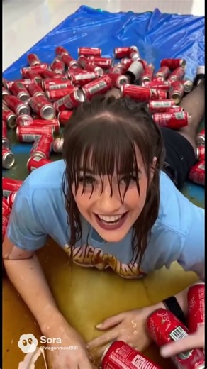 Slip and sliding right into a can pyramid! #slipandslide #shorts