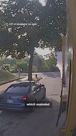 Trash collector thrown to ground by garbage explosion