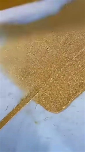 Gold powder coating for ceramic gap detailing and finish work