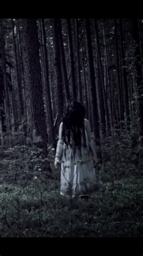 Ghost Girl Standing Alone in the Forest