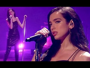 Dua Lipa rocks out in an edgy black leather dress and thigh-high boots as she sings her hits for Pan