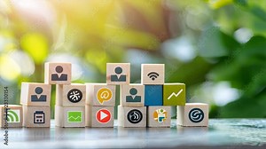 Building Blocks of Digital Connection: Wooden blocks adorned with social media icons form an upward trend, symbolizing growth and engagement in the digital landscape.