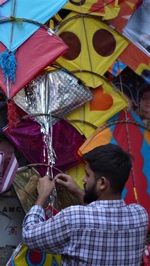 Vraj:bhoomi on Instagram: "Skyful of vibrant kites& streets full of joyful people. Hustling corners of the old walled city and & bustling emotions with new hopes. Moods wrapped in spools of threads & woven in traditions with changing trends. An array of busy make-shift stalls & an everlasting grandeur of festive spirit. Lit up faces and painted skies Forever inseparable, are Gujarat & its kites! . . . . #uttarayan #heritage #gujarat #amdavad #explore"