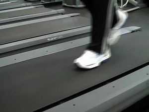 clip-109051-woman-walking-slowly-on-treadmill