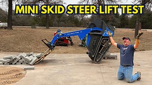 Lift challenge testing mini skid steer performance and strength