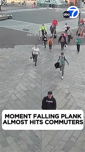 WILD CLOSE CALL: The moment a falling #plank almost hit people waking into a #Boston station was caught on video. The Boston Inspectional Services Department told local media that “rigging gear” fell from a #skyscraper. No one was hurt.