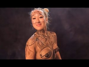 exceptionally beautiful bodypainted model, body art at its best!