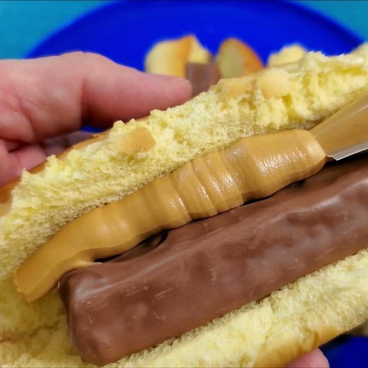 eat Snickers and Peanut Butter in Hotdog Bun