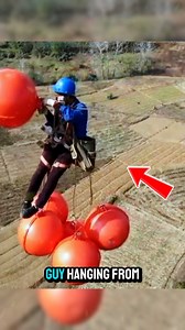 Why Are There Brightly Colored Balls on Power Lines? Why do power lines have brightly colored balls? These are air markers used to alert low-flying aircraft like helicopters and small planes, helping to prevent accidents. They're vital for safety near airports or in hilly areas. Curious how they’re installed? Credits : @tdworld4911, @amazingtechnology9451, @sophiaguo7809, /yt #SafetyFirst #AviationAwareness #HighTechSolutions #technology #usa | TasTy Maker Kerala | Facebook