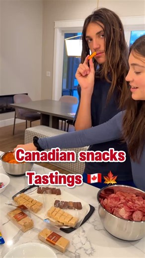 Canadian Snacks Taste Test 🇨🇦 | Hit or Miss? Cheetos look-alikes, Smarties, and ketchup chips?! Cosimo and Emma try some classic Canadian snacks, reactions included 😆 Would you try these? #CanadianSnacks #SnackTasteTest #FamilyReels | The 5 World Explorers