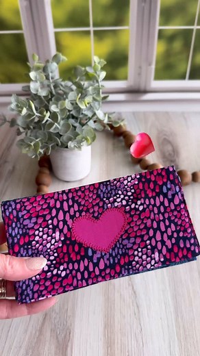 Check out these heart themed checkbook covers that I make. They are available in my Etsy shop in limited quantities. Feel free to tag your friend that still writes checks - this is a no shame zone lol. Hey, it’s a great way to keep track of your finances and to teach the teens in your life how to be responsible with money. #moneymanagement101 #checkbook #olderwomenrock #financiallyresponsible #managemoney | Sew Happy Quilting