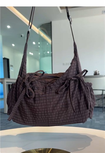 Stylish Street Fashion with a Plaid Shoulder Bag