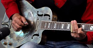 James Van Nuys Plays a Bronze Dean Brand Resonator Guitar