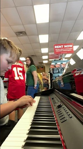 playing spow from hfjone inside of a music & arts store