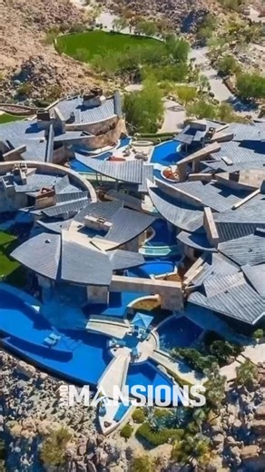 180K views · 2.6K reactions | Inside this $42 million masterpiece in Palm Desert, California. It features a remarkable aquarium tunnel that leads you to the gracious dining room, showcasing two tanks of exotic fish and a rare shark tank. | Mansions of USA | Facebook