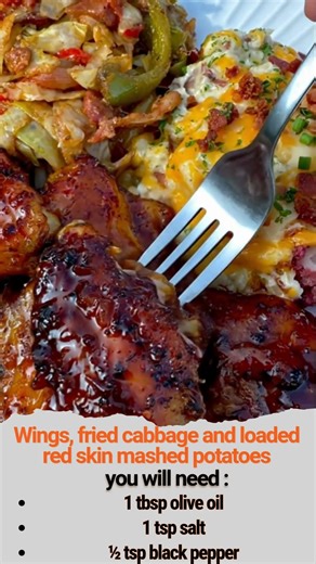 Wings, fried cabbage and loaded red skin mashed potatoes