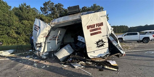 Traffic resumes after garbage truck crash causes hydraulic fluid spill on U.S. 84